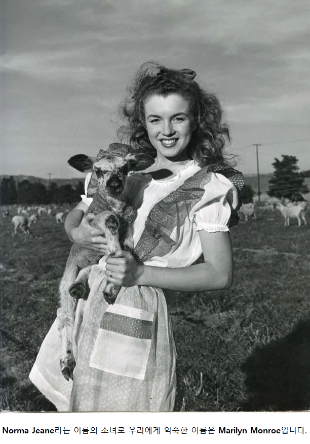 A girl who took a picture with a baby goat in 1945.