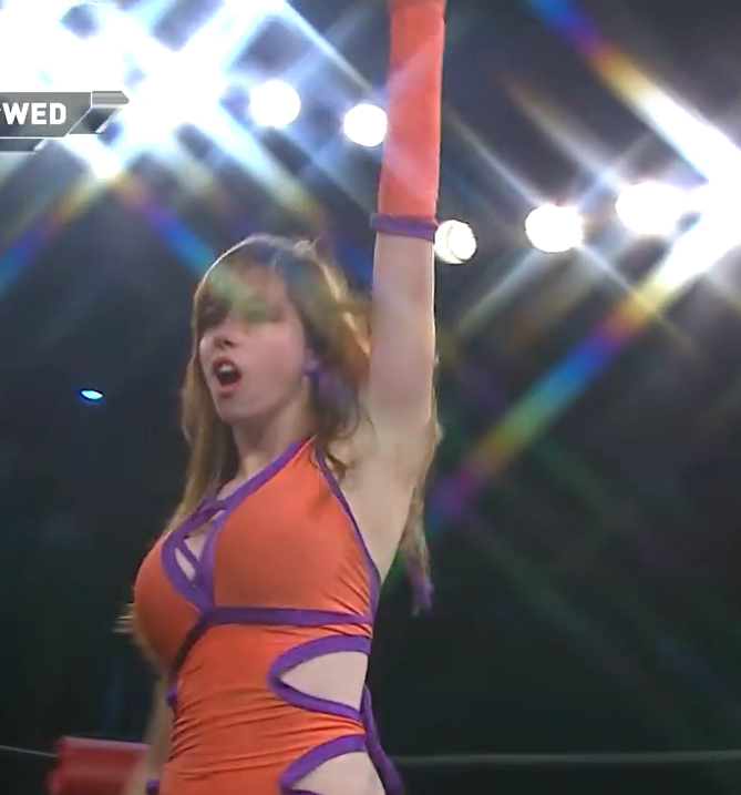 A female wrestler who is very likely to scout for WWE this year.gif