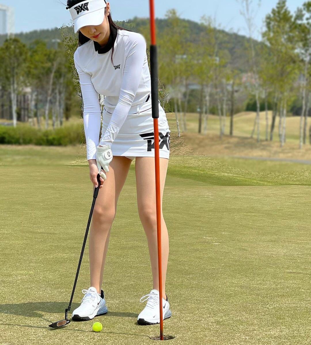 Cho Hyun, who's wearing a golf outfit.