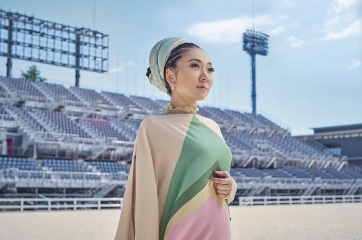 Japanese singer Misha sings "Kimigayo" at the opening ceremony of the Tokyo Olympics.