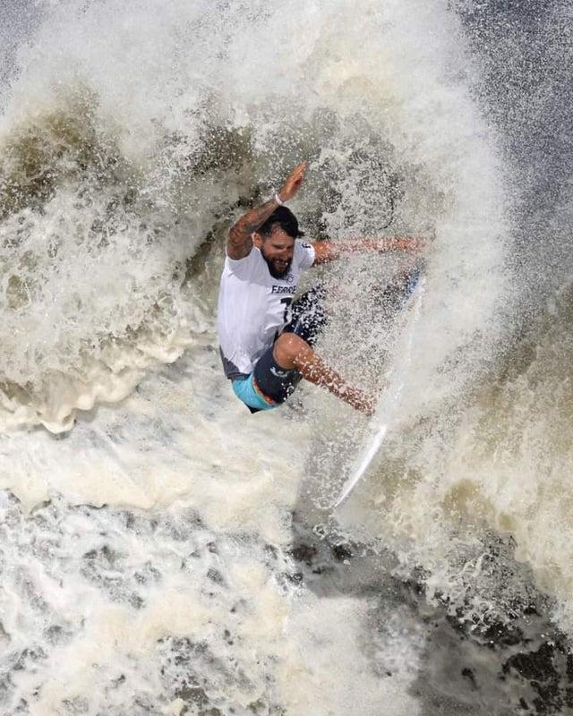 Brazilian surfer who won the gold medal in dung water.jpg