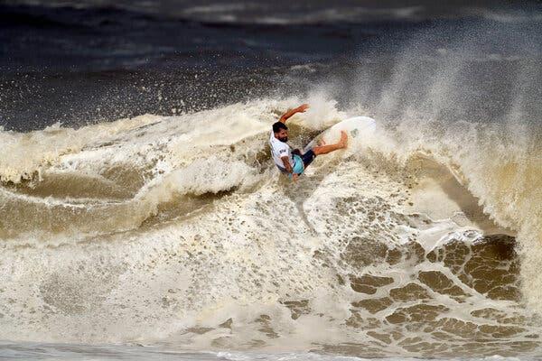 Brazilian surfer who won the gold medal in dung water.jpg