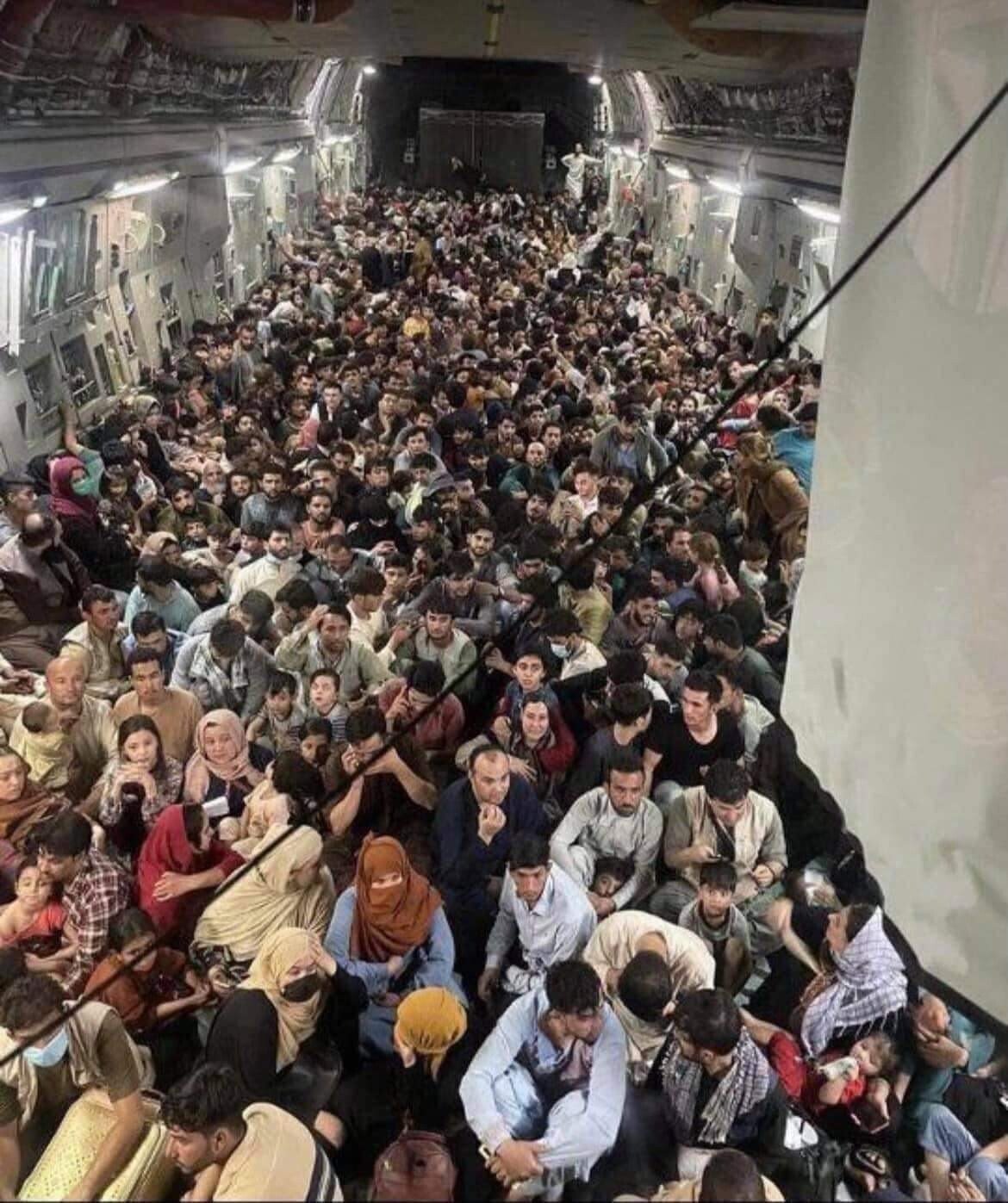 Inside a transport plane escaping from Afghanistan.