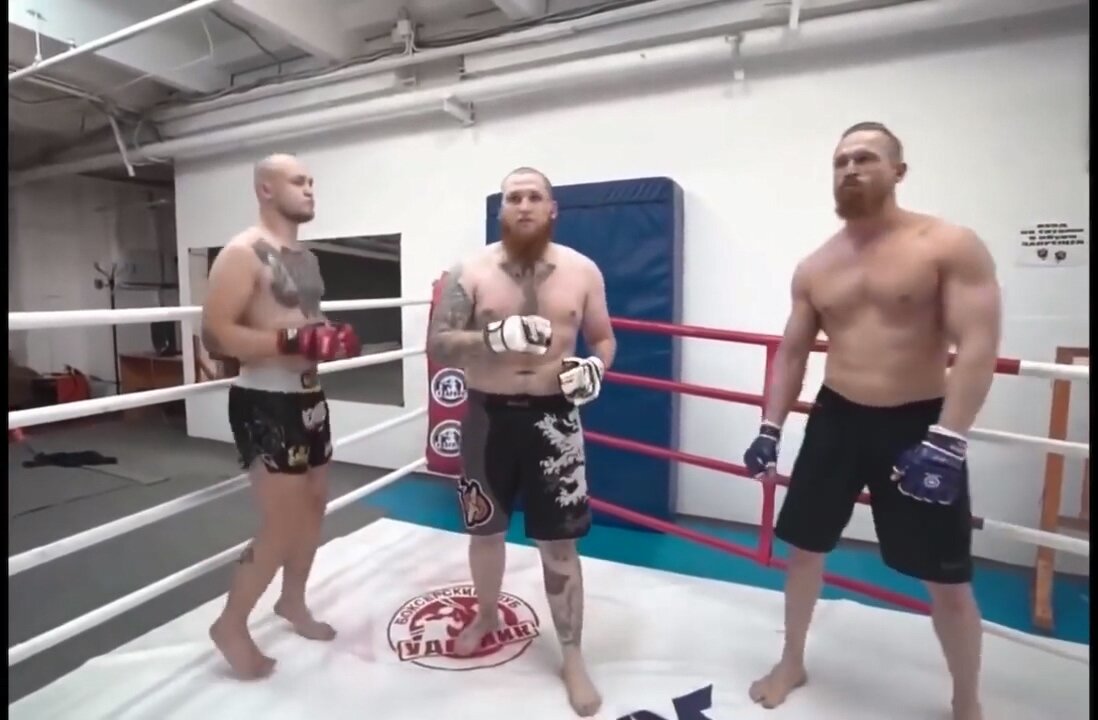 Heavyweight fighting 1 vs. 3 ordinary people who exercised a bit.gif