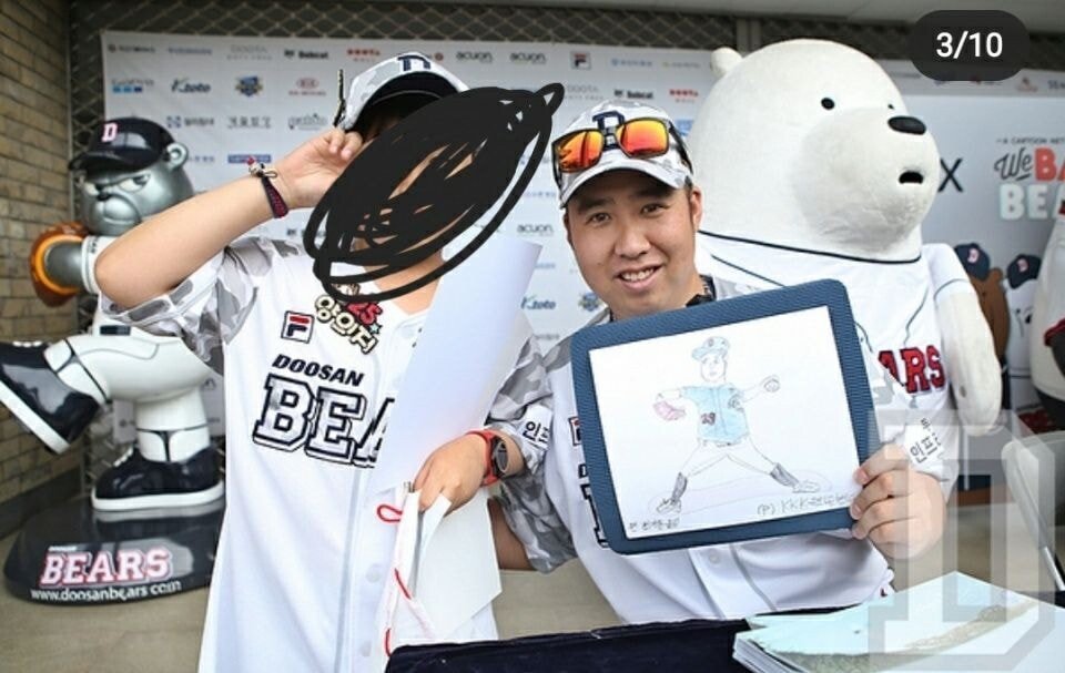 A child fan who gave a picture to a baseball player.