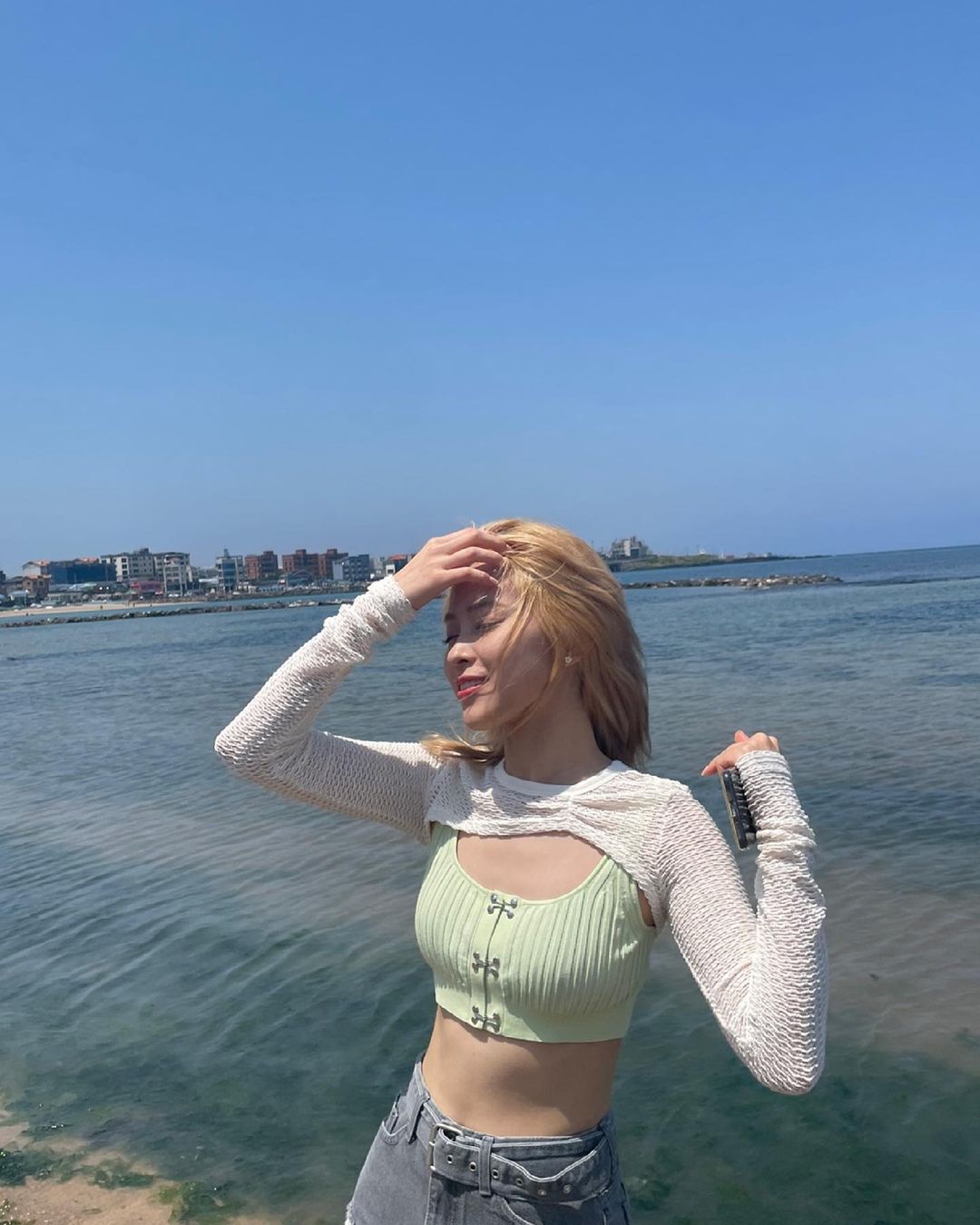 ITZY went to the beach in Jeju Island.