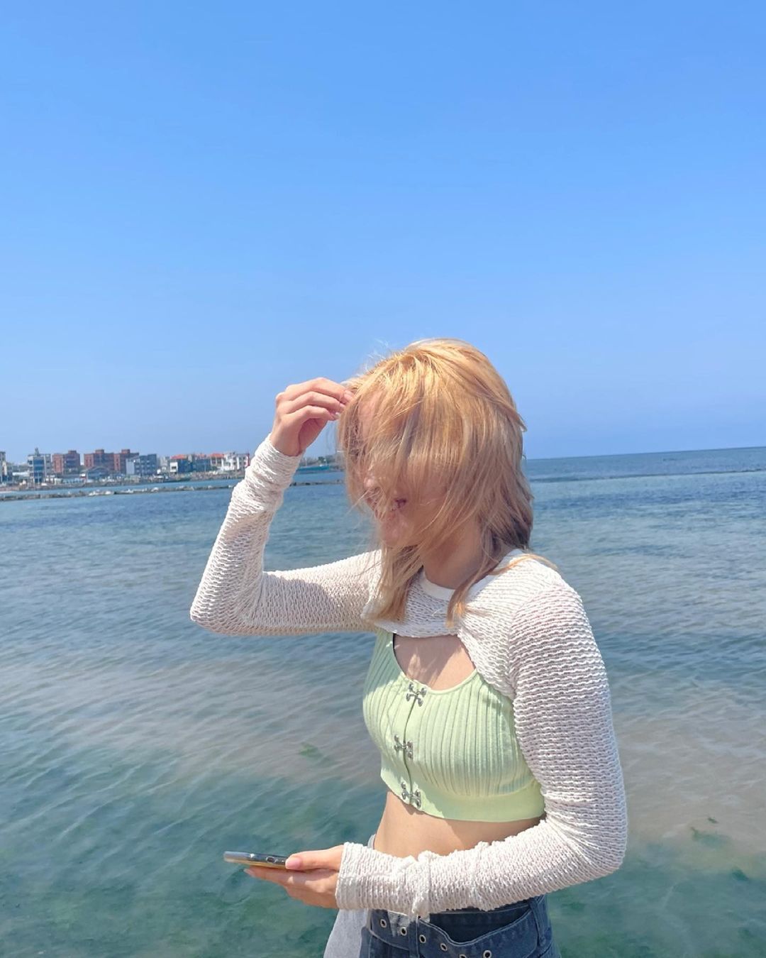 ITZY went to the beach in Jeju Island.