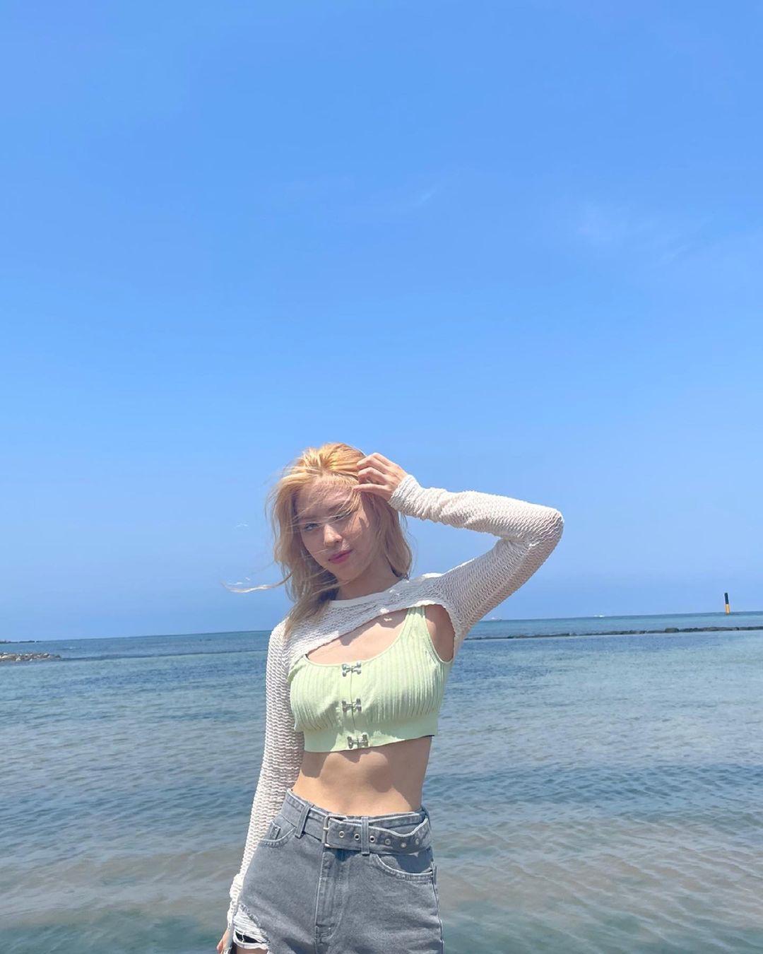 ITZY went to the beach in Jeju Island.