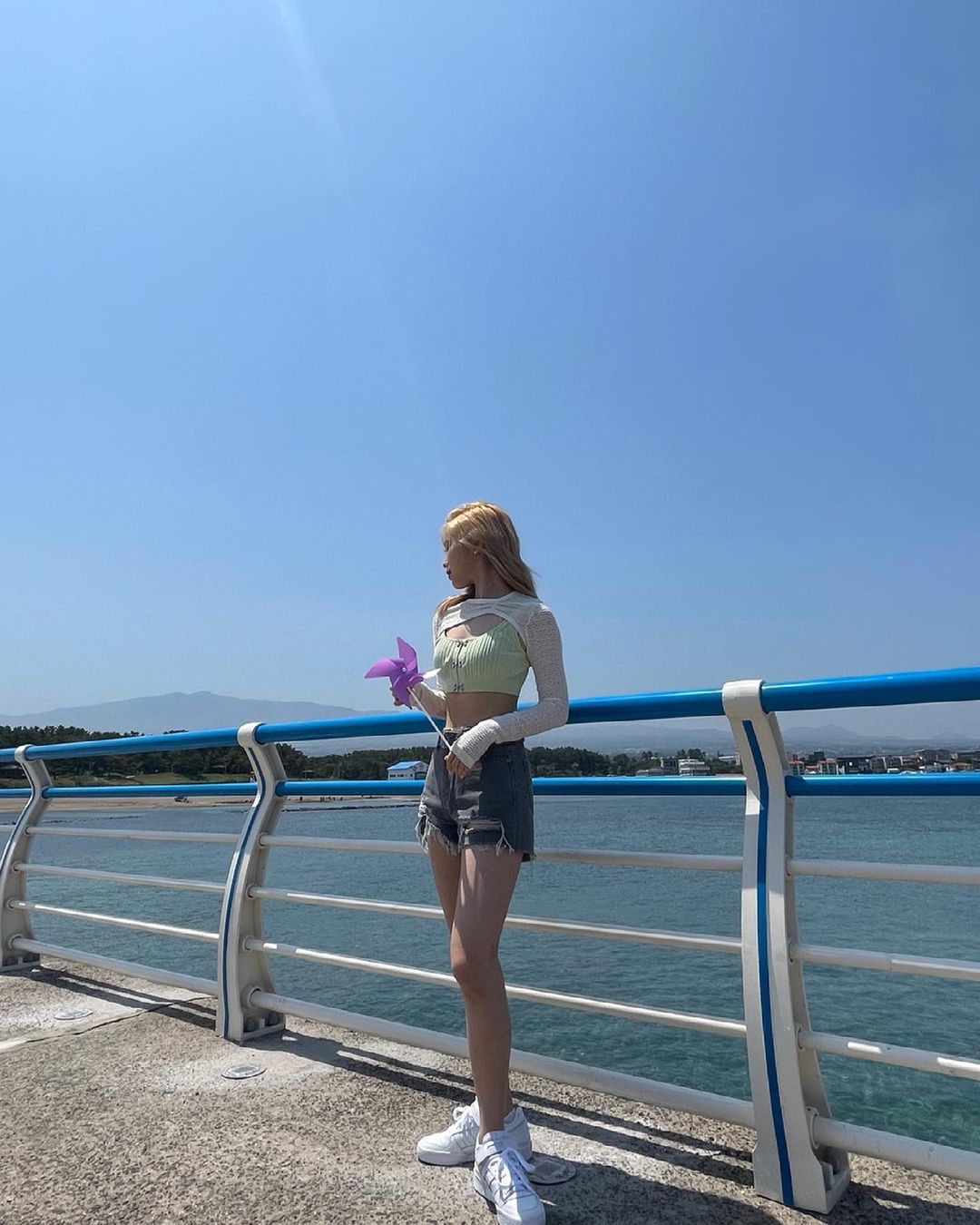 ITZY went to the beach in Jeju Island.