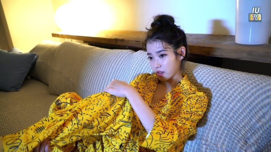 Yellow pajamas with bun hair IU.