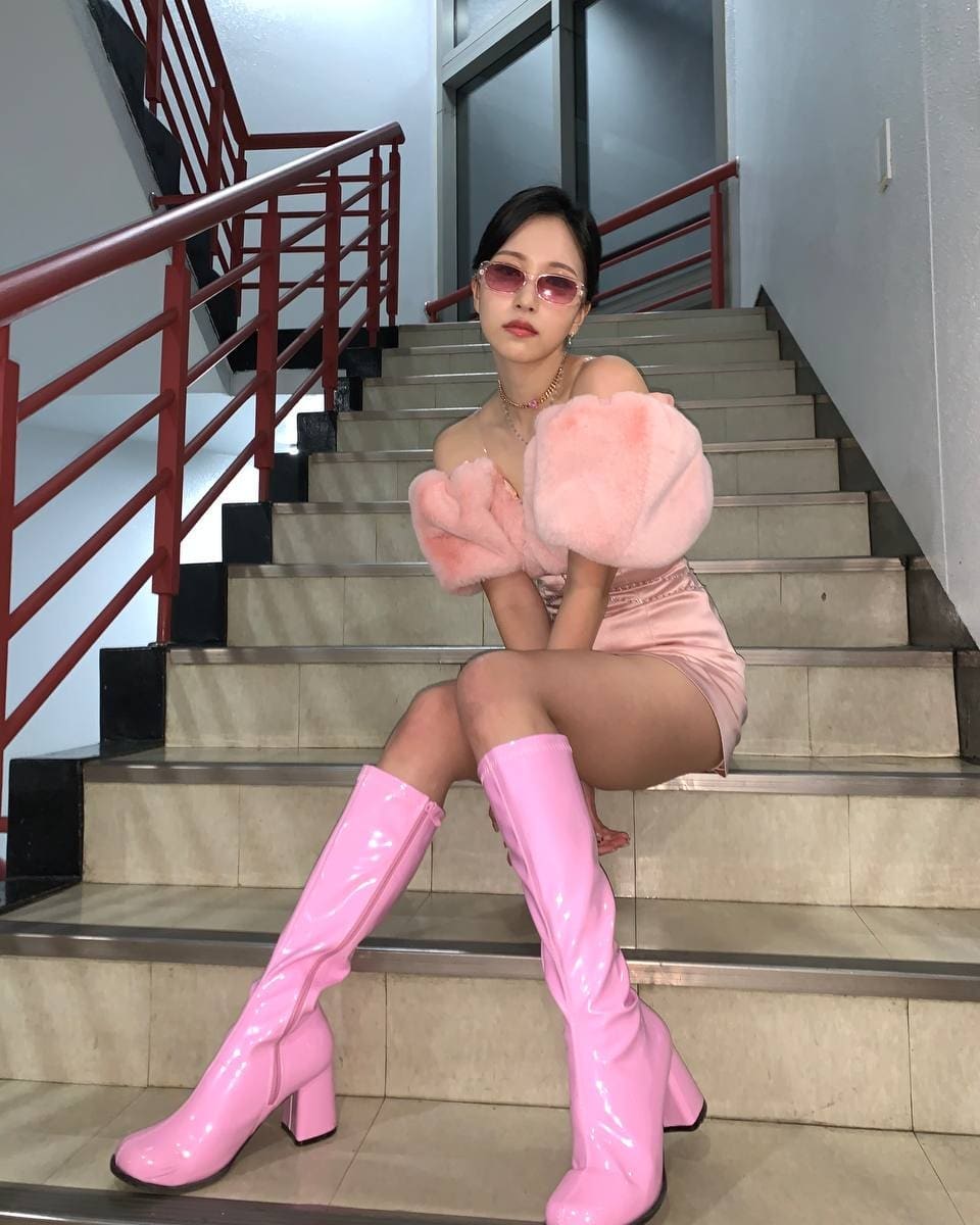 MINA on the stairs.