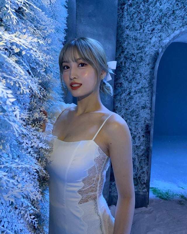 Frozen MOMO's white see-through dress. Aggressive chest volume.