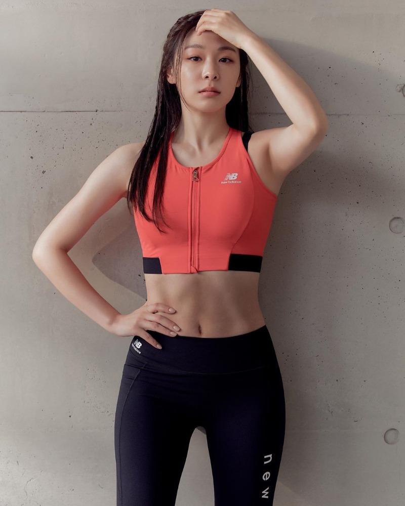 Orange tank top leggings. Yuna's abs and belly button.