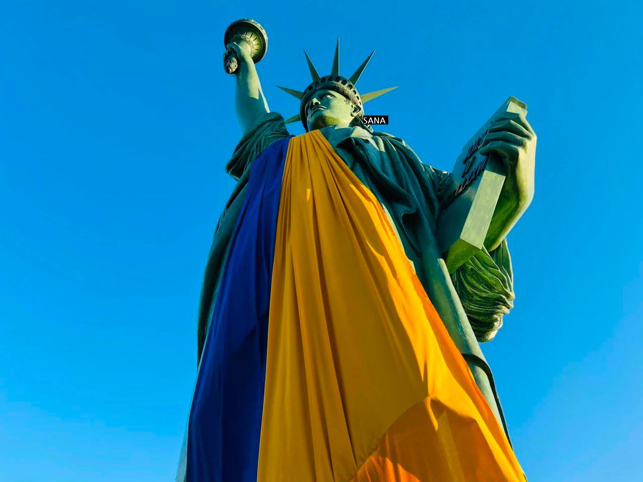 The Statue of Liberty wearing the Ukrainian flag.