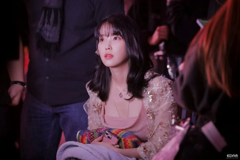 IU